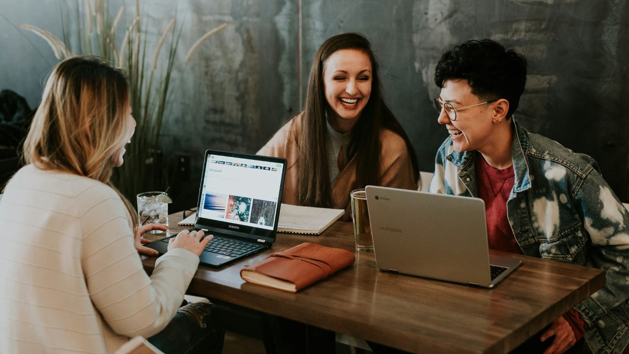 Board members sharing a laugh during a working session